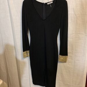 XTAREN Size medium elegant body con dress.  Very stretchy